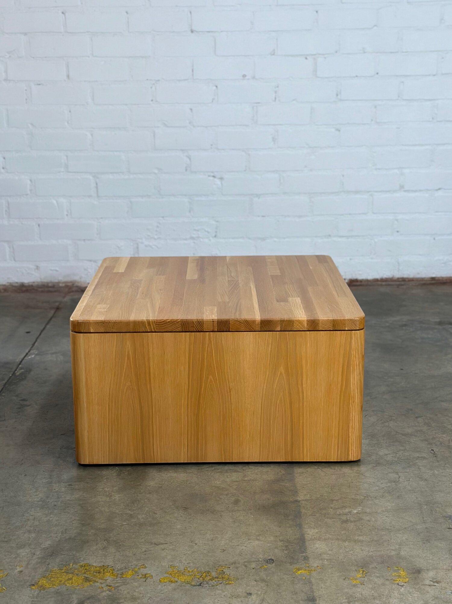 W30 D30 H16

This vintage restored coffee table with a patchwork top and horizontal oak grain along the bottom. The coroners are rounded with a minimal design and a clean finish through out.