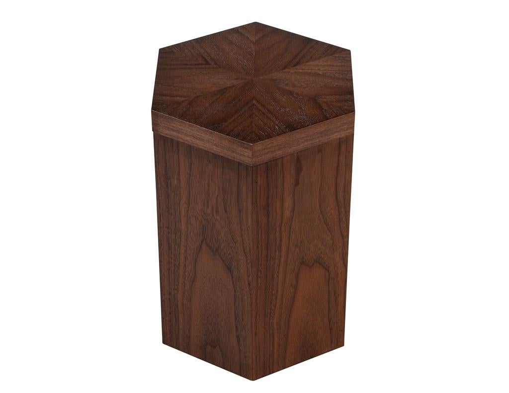 The Modern Oak Hexagonal Accent Table. This stunning piece is proudly made in the USA, crafted with precision and care to bring you a high-quality and stylish accent table. The unique hexagonal shape adds a contemporary touch to any room, while the
