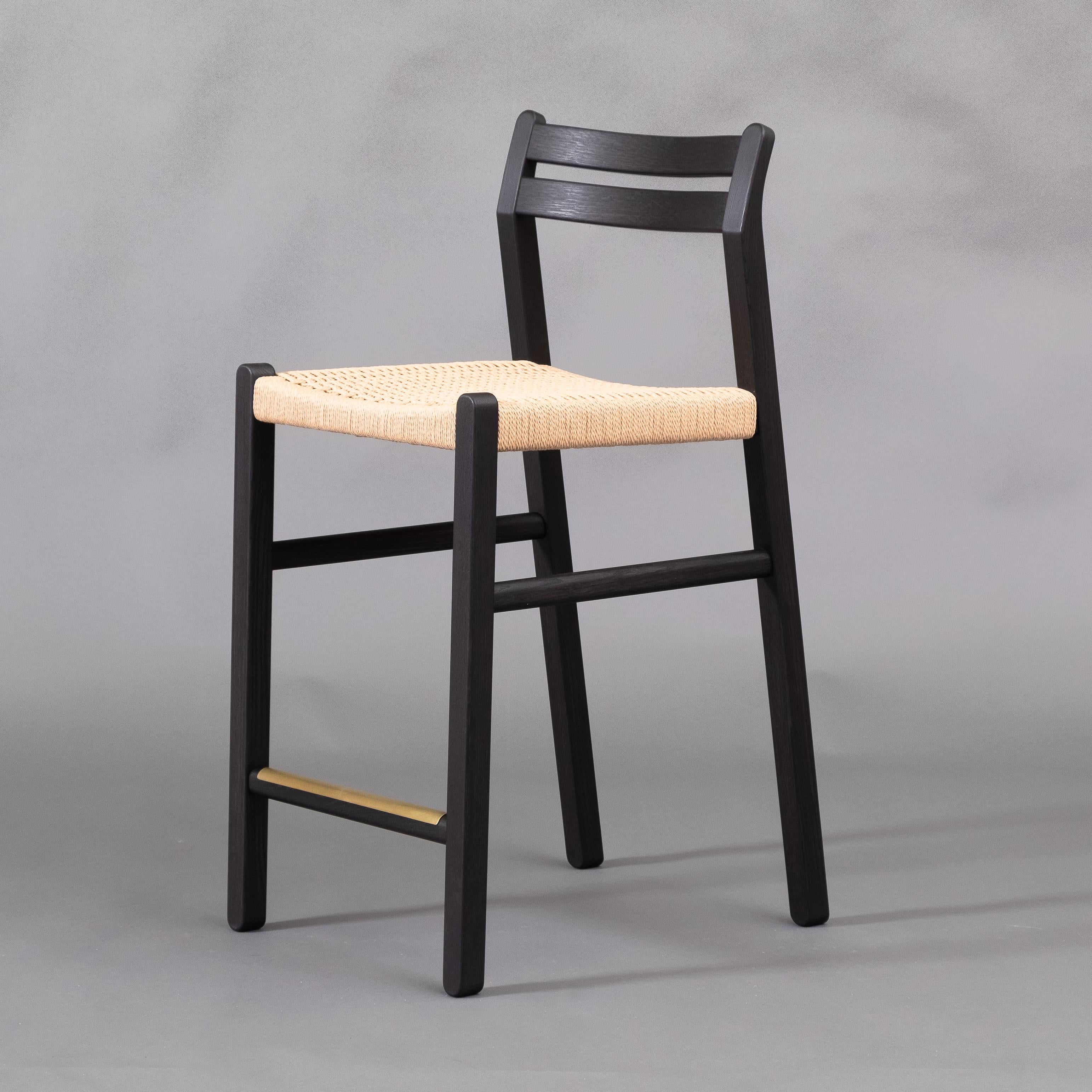 The Gladstone stool is a refined counter-height stool that blends a clean Mid-Century inspired aesthetic with traditional materials and joinery techniques. Each piece is handcrafted to order in our Ottawa studio.

The Gladstone is built using