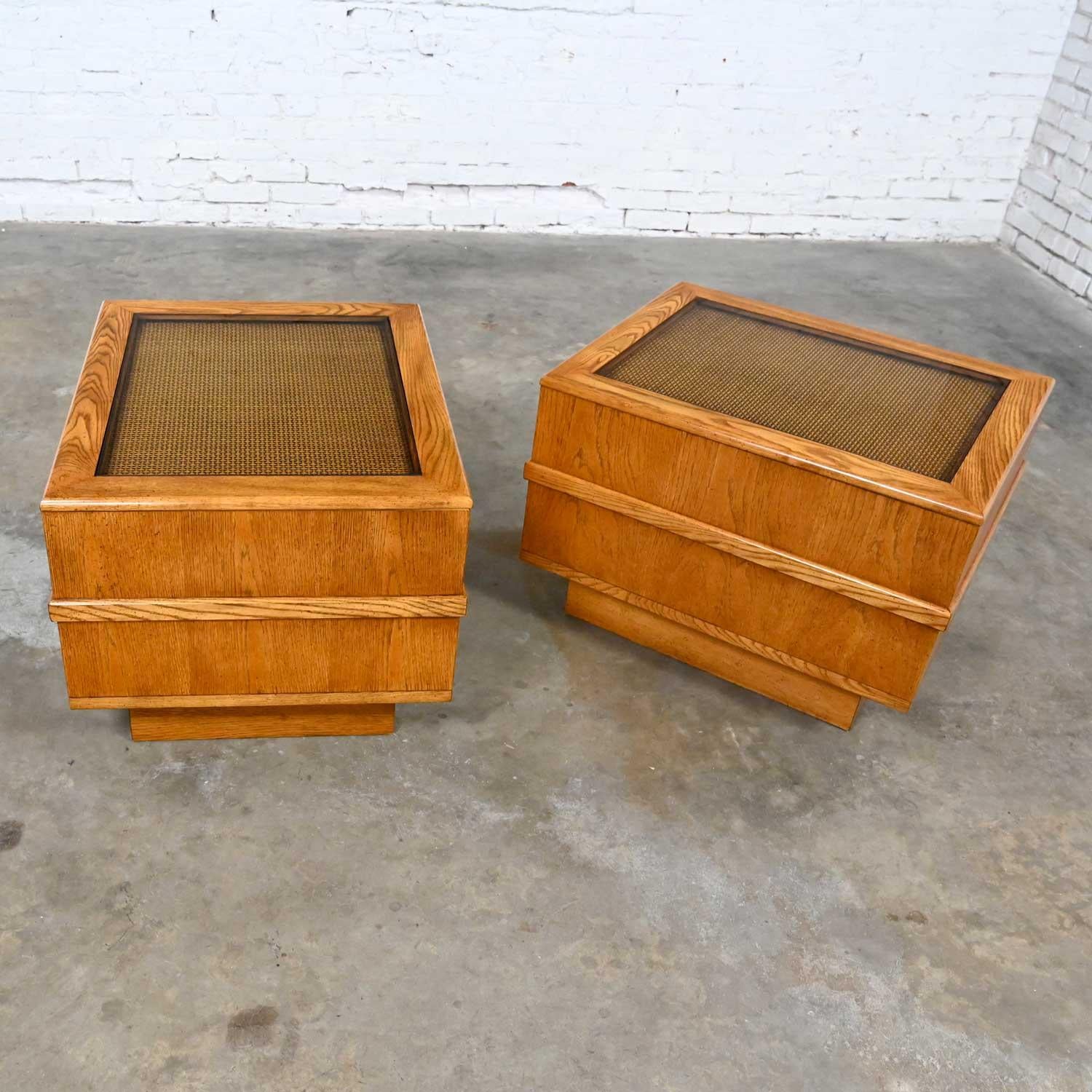 Wonderful Modern oak pedestal base end tables, side tables, or nightstands, with cane and glass insert tabletops. Beautiful condition, keeping in mind that these are vintage and not new so will have signs of use and wear. Please see photos and zoom