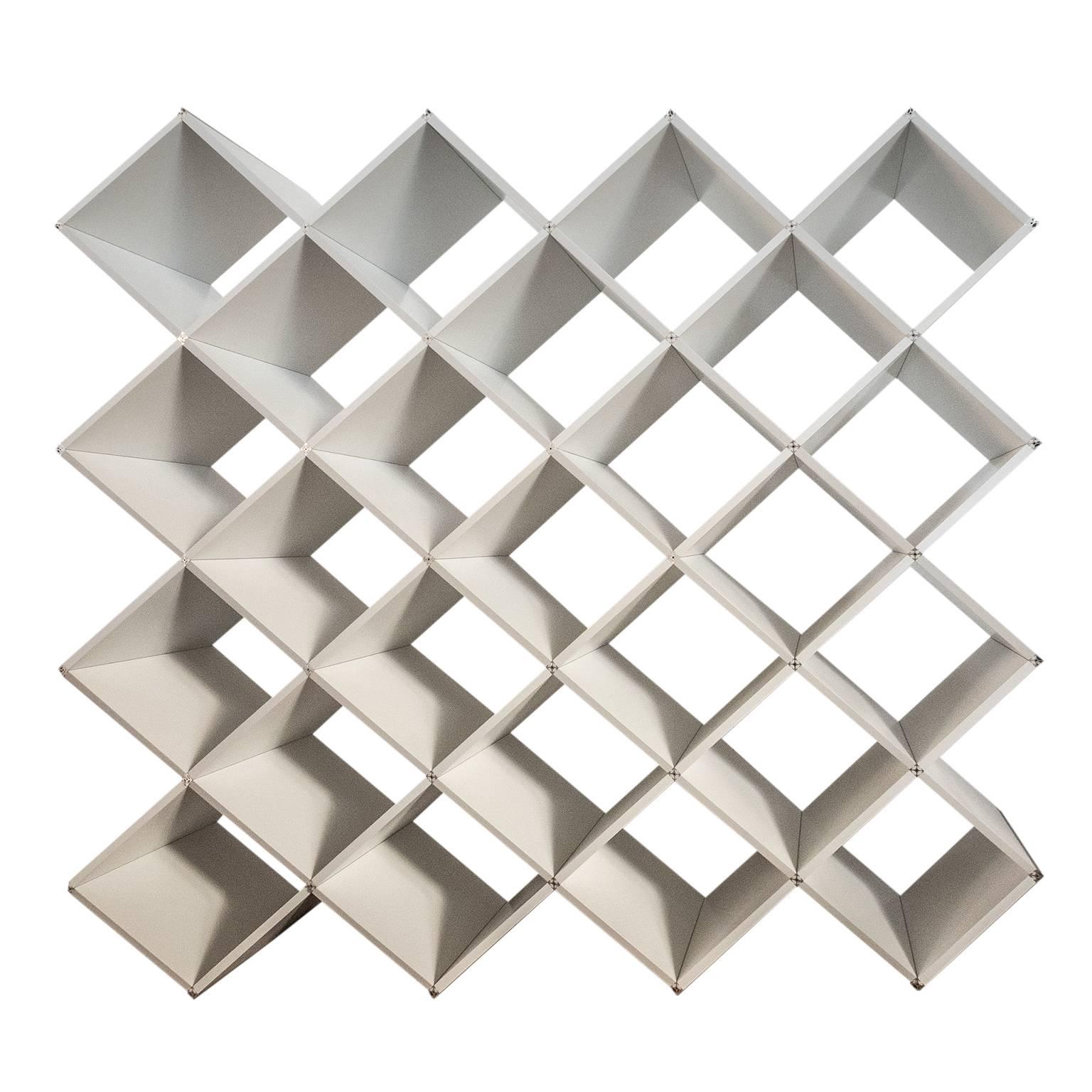 X.me is a modern oblique bookcase, designed by Salvator-John A. Liotta (LAPS Architecture) and manufactured by MYOP, with PVC foam shelves connected by a single extruded aluminum connector.
X.me fits to every types of space, wrapping them. The X is