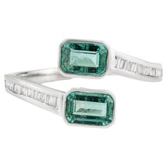 Modern Octagon Emerald Toi et Moi Bypass Ring with Baguette Diamonds in 14K Gold
