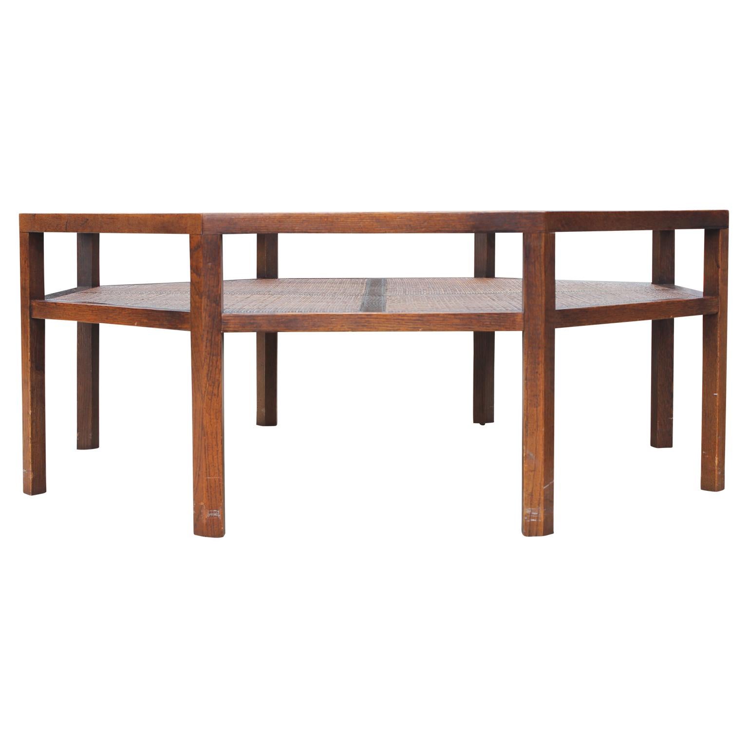 Beautiful octagon shaped walnut coffee table with a glass top. Perfect piece to tie together a sitting room.