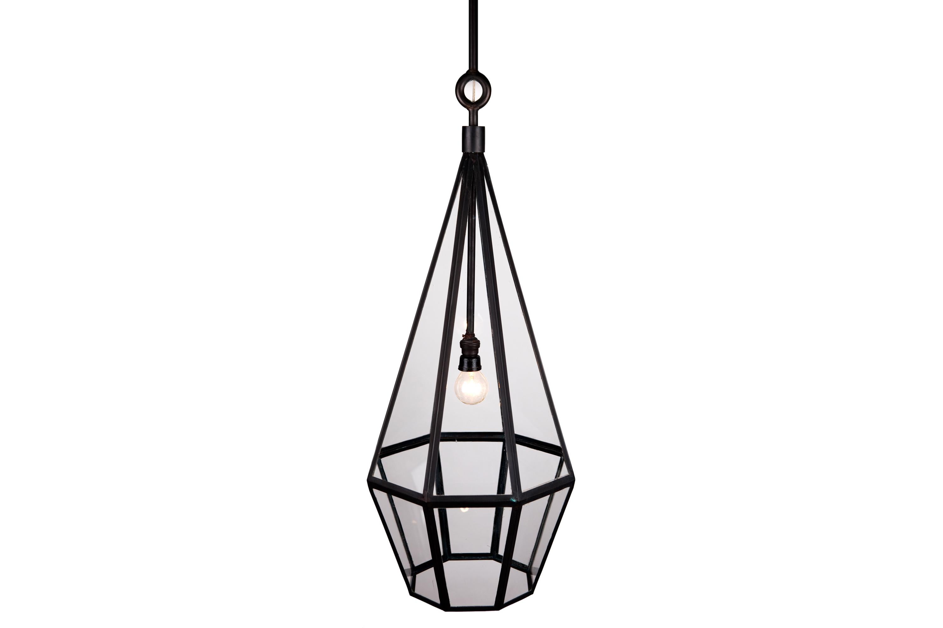 Lantern in chemically colored brass filled with glass and provided from e14 socket en lamp.
For inner and outer use.