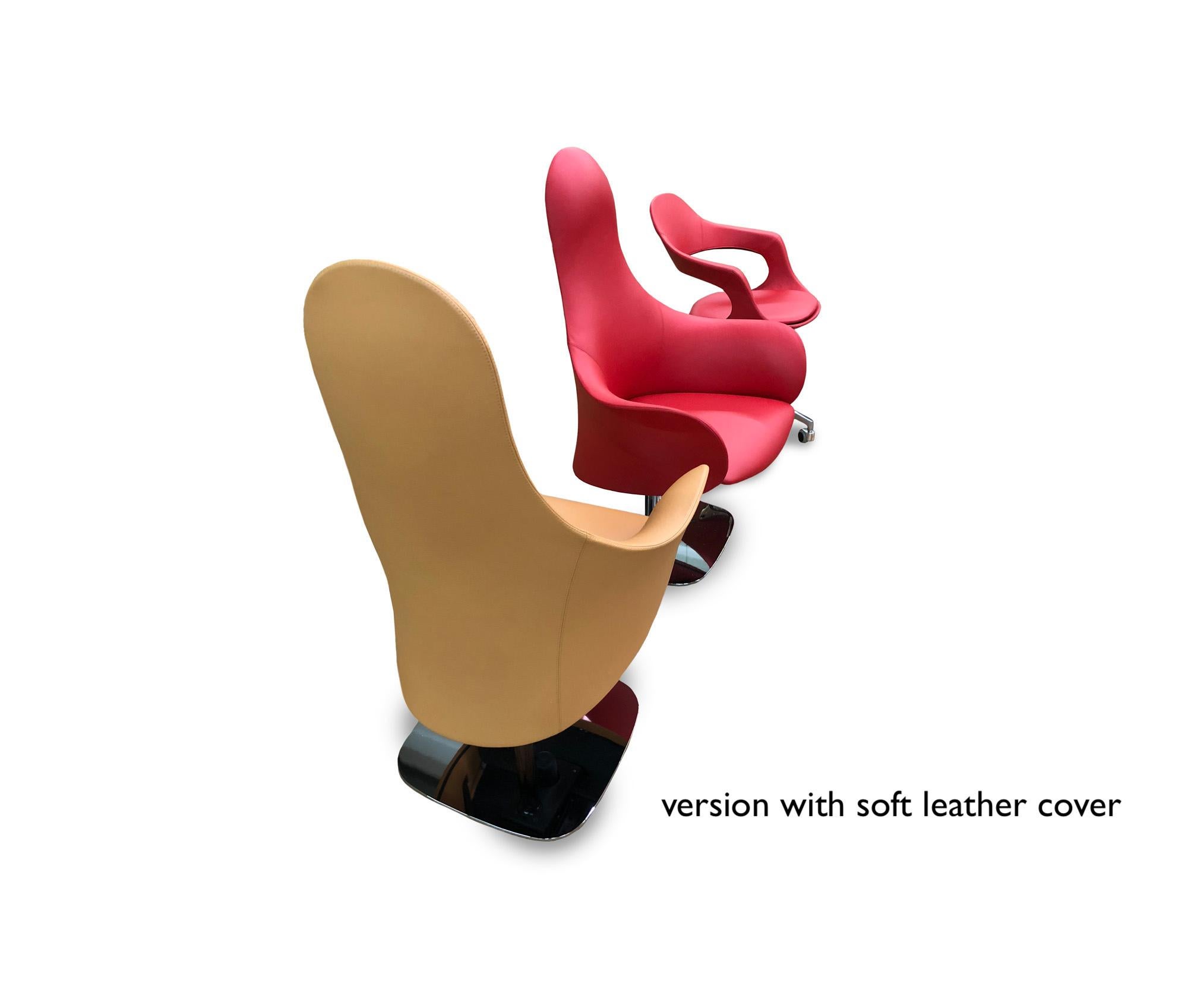 This is an Italian modern office chair, made in Italy, imported from Italy. It features a distinctive design, rarely seen in office designs. This modern swivel office armchair is a true beauty and is made of a rigid polyurethane shell structure with