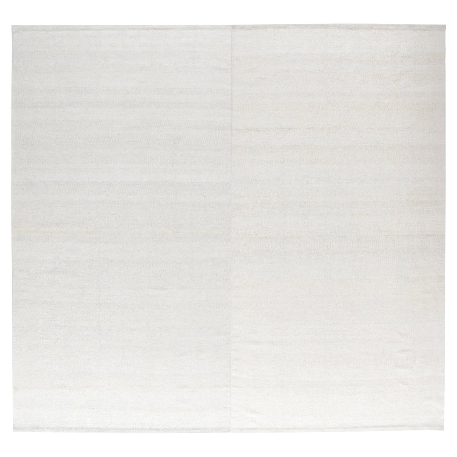 Tappeto moderno in cotone organico Zeillu a tessitura piatta di colore beige chiaro avorio