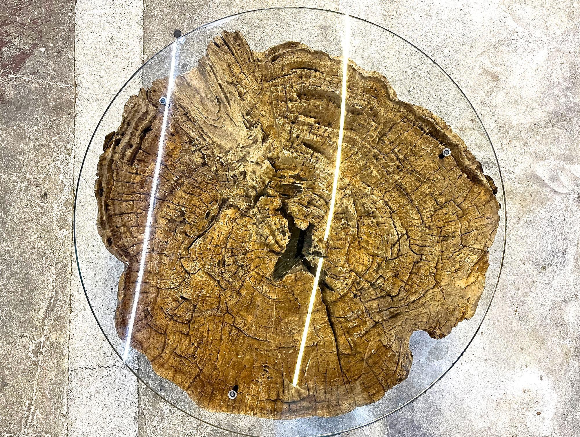 round driftwood coffee table with glass top