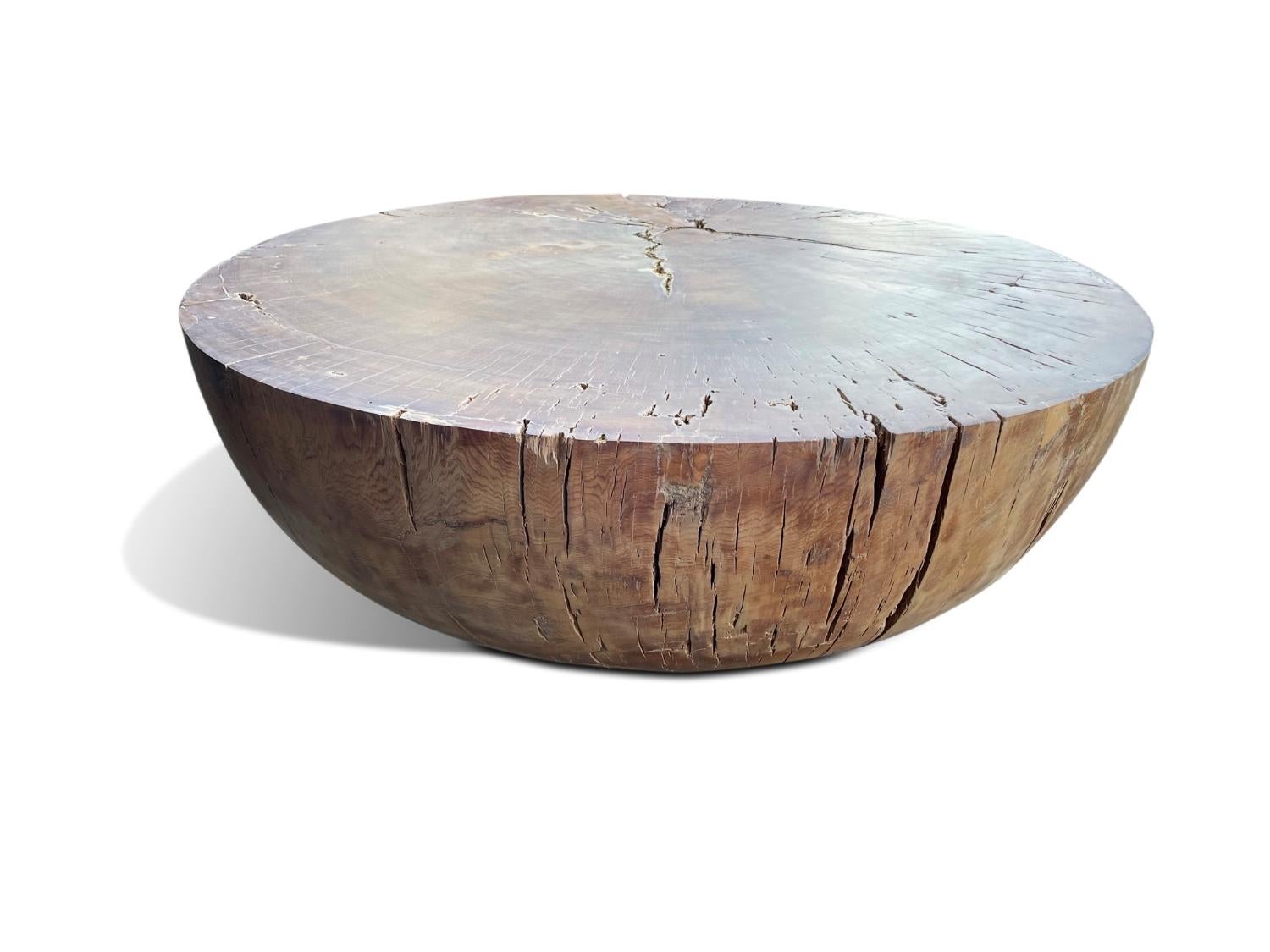 Modern organic drum coffee table made from reclaimed New Zealand ancient Swamp Kauri wood. 

A large modern organic coffee table made from New Zealand 40,000-year-old Ancient Swamp Kauri. Hand carved in Christchurch, New Zealand from a single block