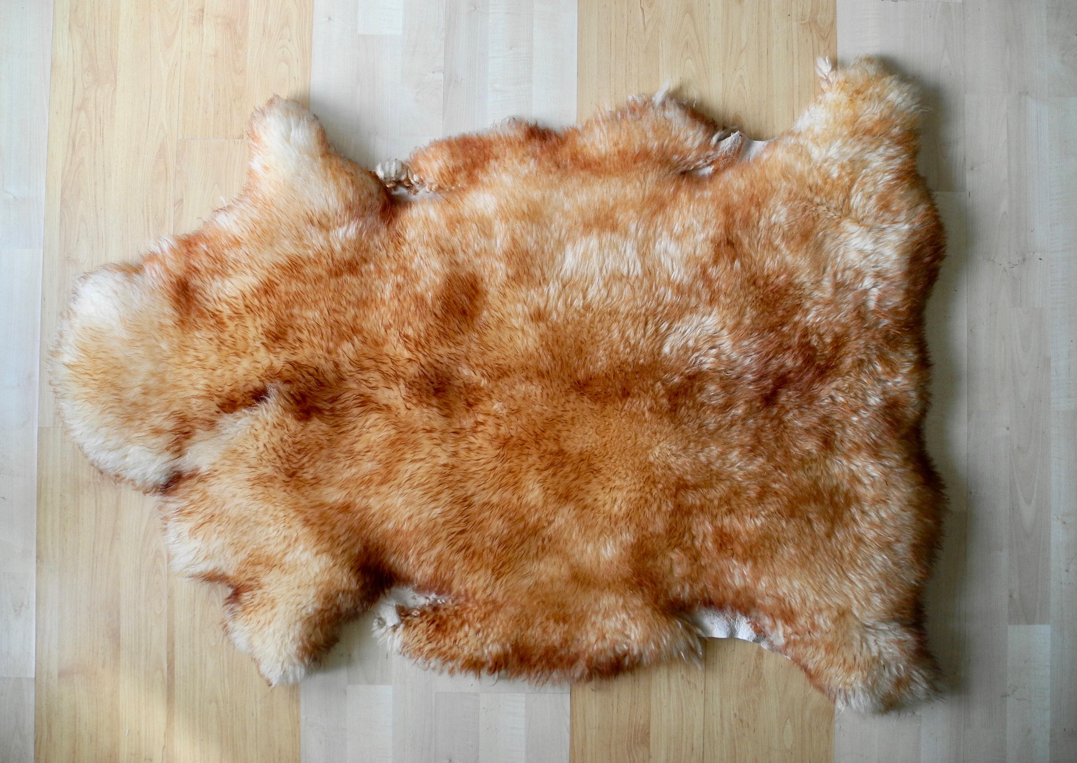 This large sheep skin is super soft and warm. Place on the floor or on a piece of metal furniture for warmth and comfort. It's also very boho chic.