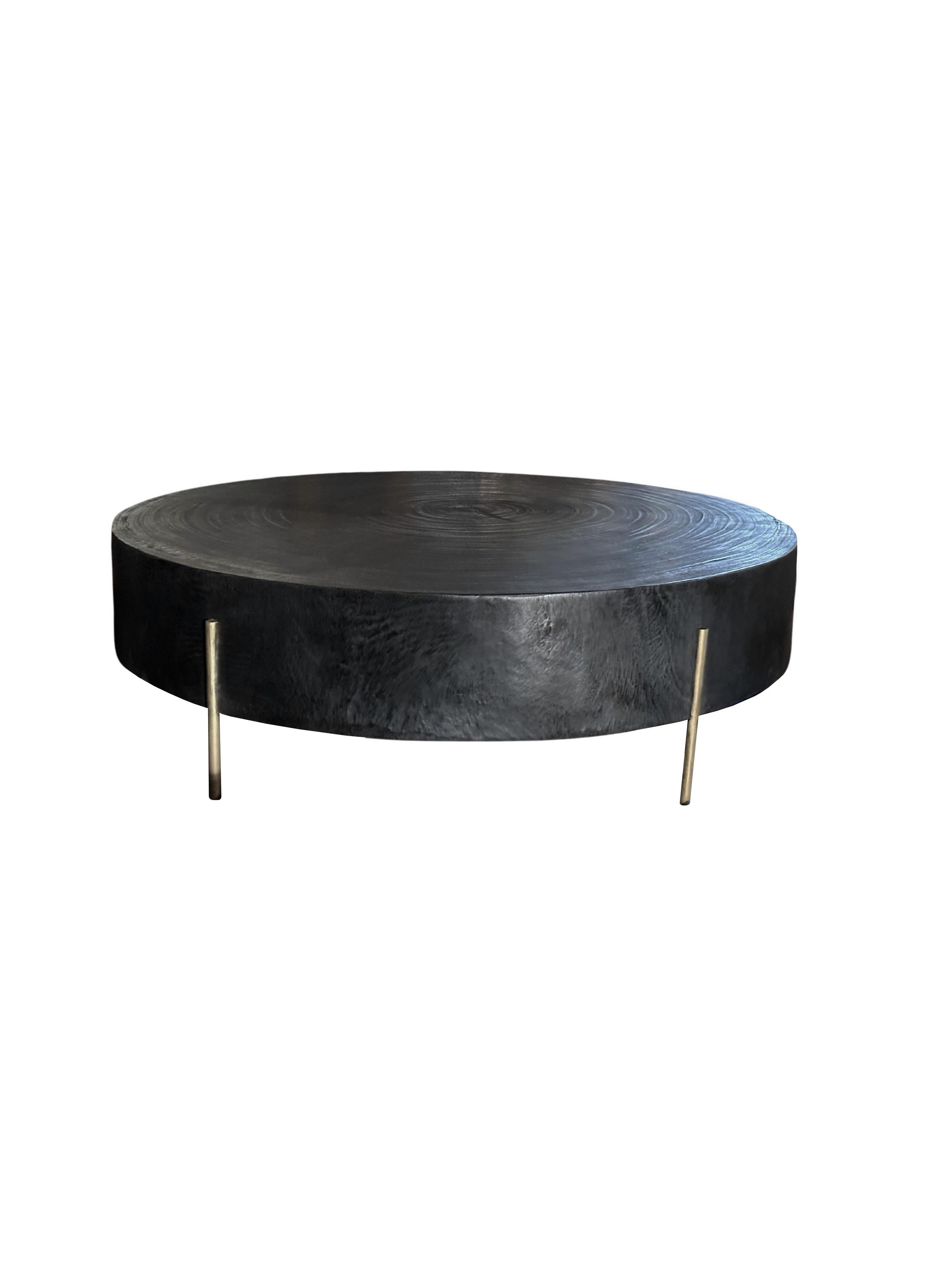Indonesian Modern Organic Side Table Crafted from Mango Wood with Brass Legs, Burnt Finish For Sale