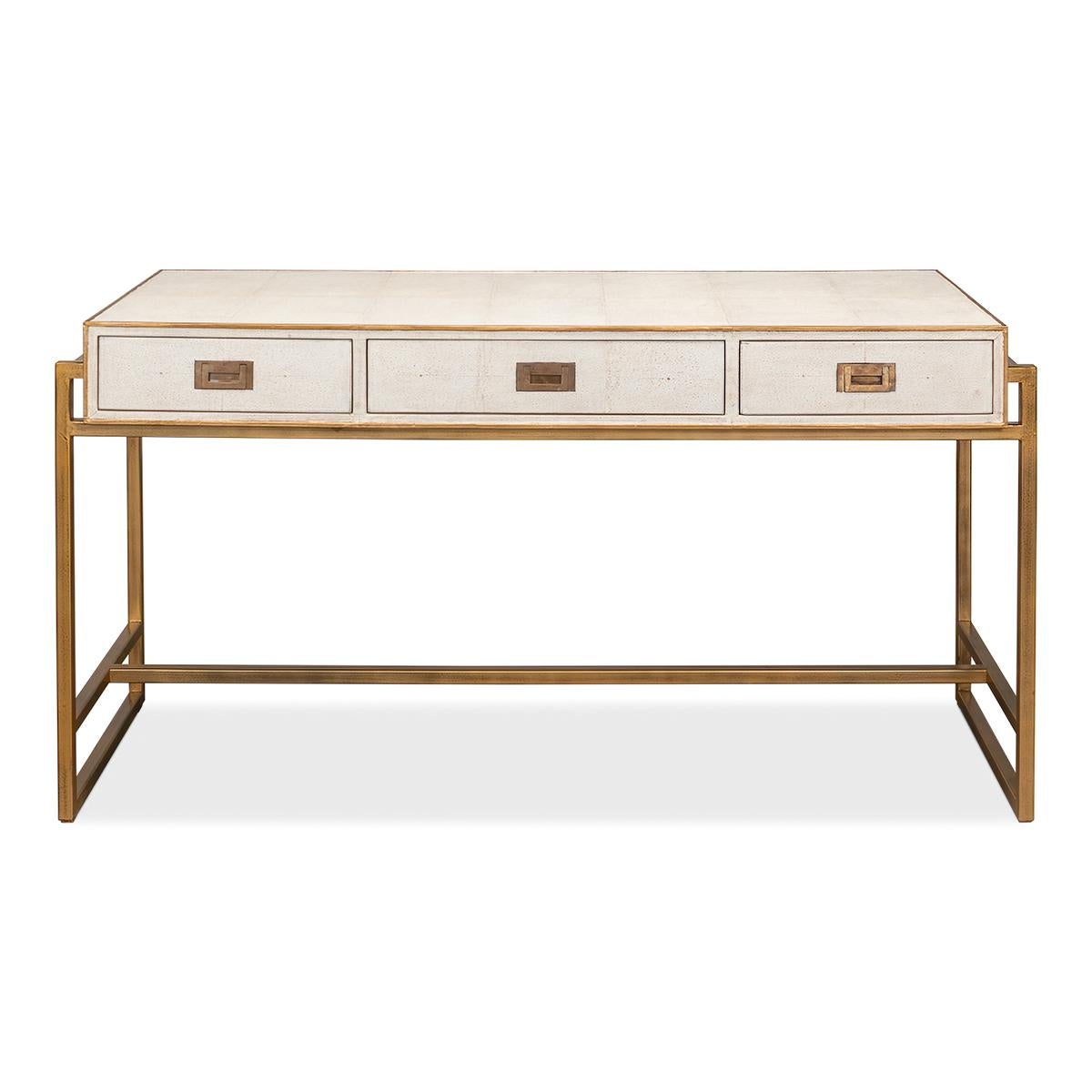 A modern osprey white embossed leather desk with a brass finish iron-framed base. Three drawers with marbleized paper-lined interiors and with brass pull handles.

Dimensions: 60