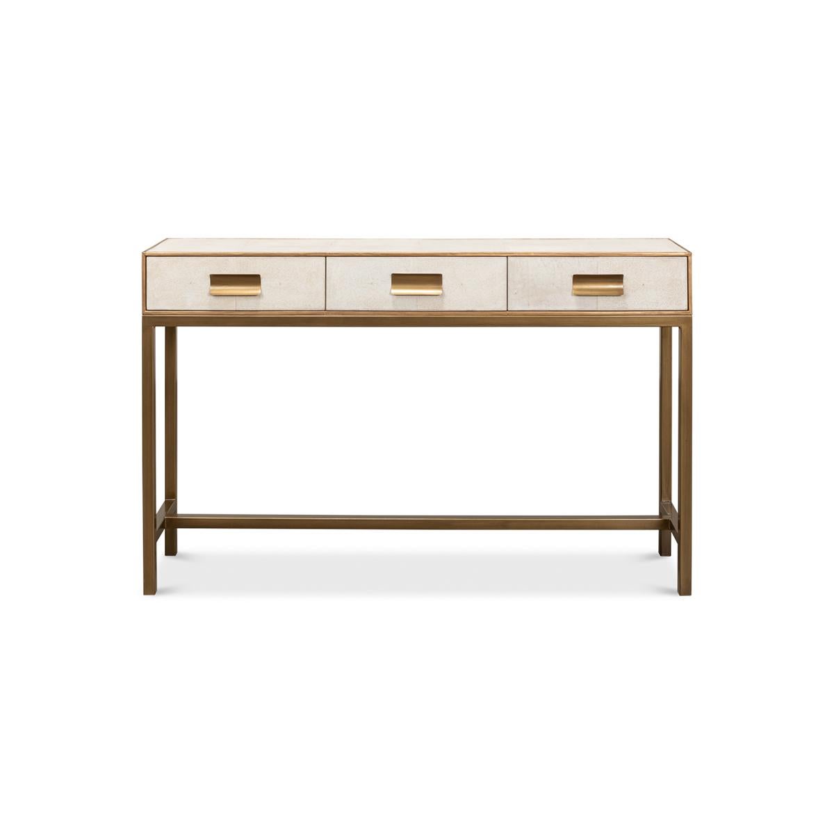 Modern Osprey White Leather Wrapped Console with gilt trim, three frieze drawers with marbleized interiors, brass handles and raised on H stretcher base.

Dimensions: 54