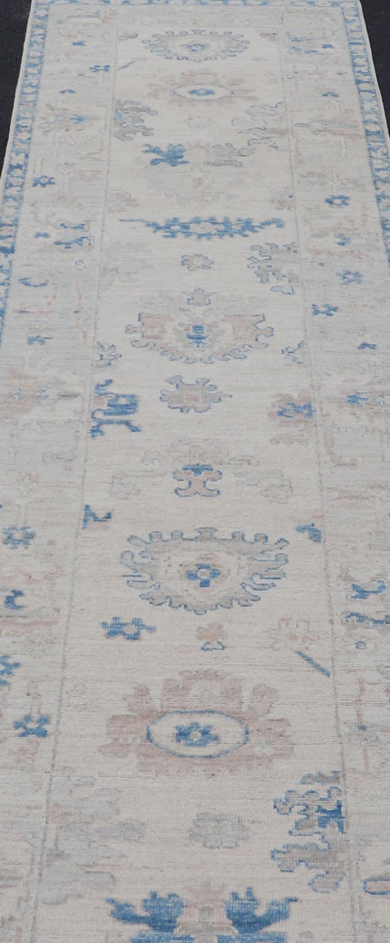 Contemporary Modern Oushak All-Over Floral Design Runner In Cream, Tan, and Blue For Sale