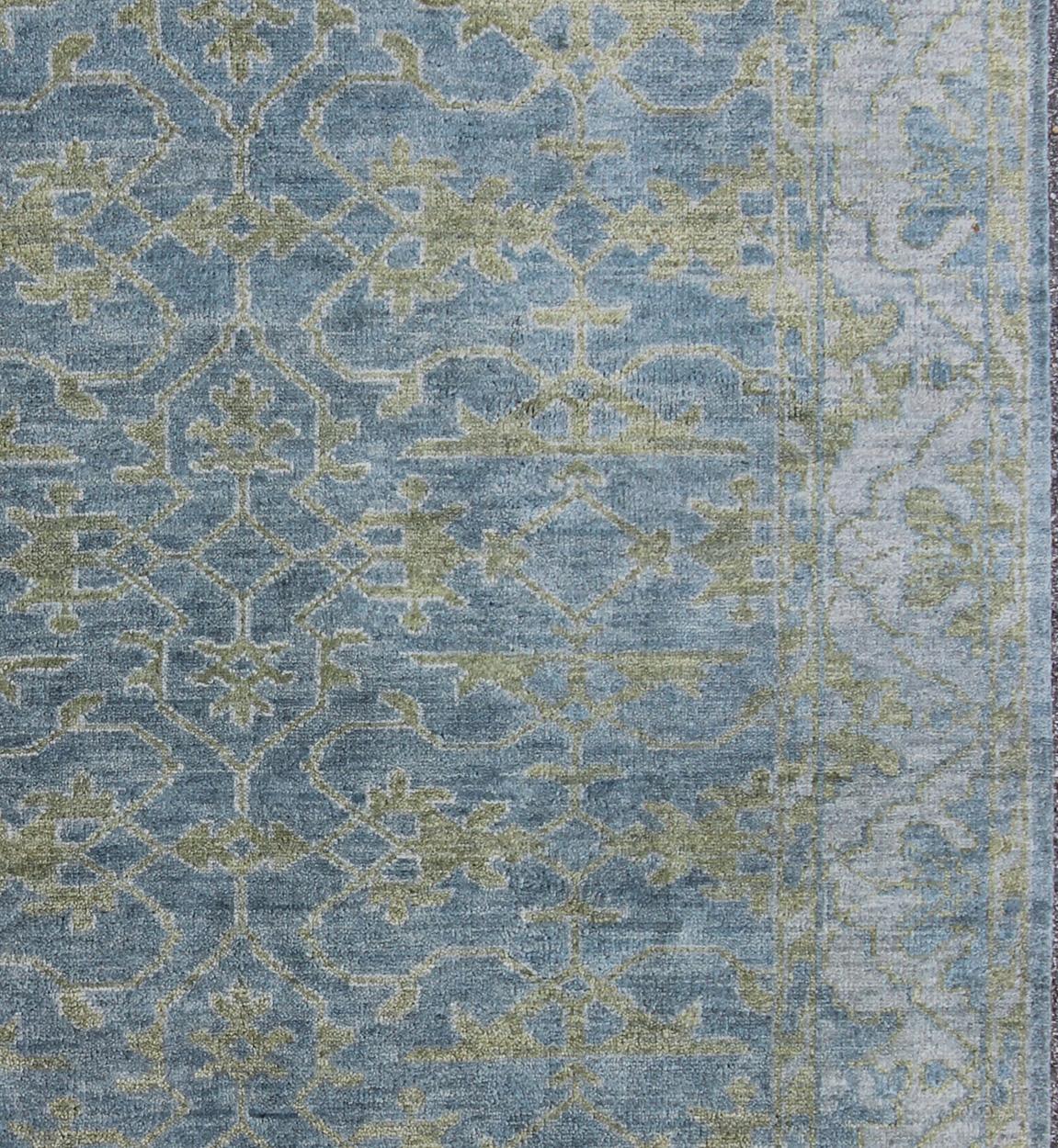 Blue grey and green Oushak, Keivan Woven Arts, Gray and Green Oushak, rug OB-103433558-0623019, country of origin / type: India / Oushak, circa late-20th Century, Modern Oushak Rug.
 
Measures: 7'9 x 9'9.
