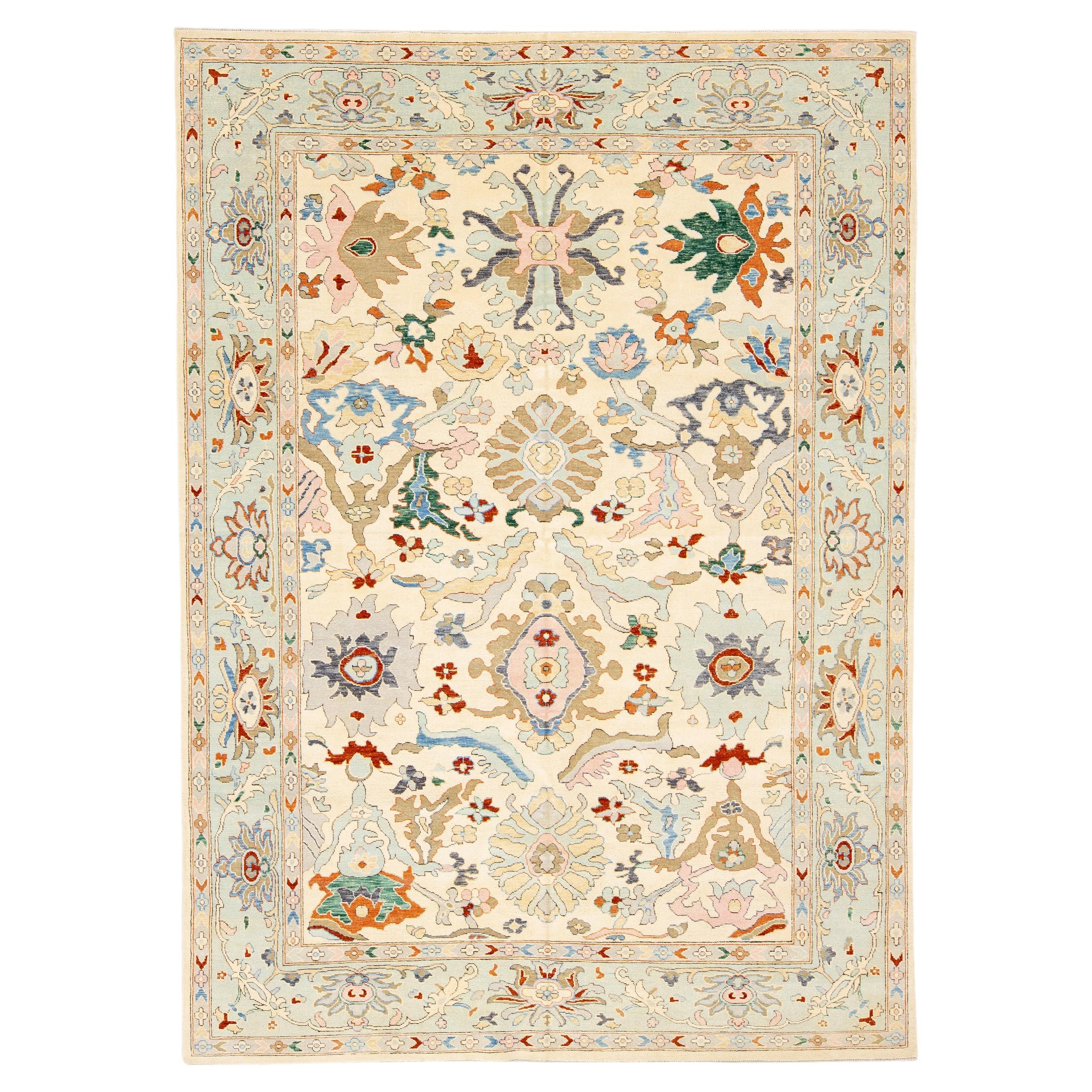 Modern Oushak Beige Handmade Tribal Floral Pattern Wool Rug For Sale at