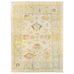 Tapis moderne en laine jaune à motifs floraux Oushak fait à la main