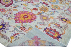 Moderner handgefertigter Oversize-Teppich aus blauer Wolle mit mehrfarbigem Blumenmuster von Oushak