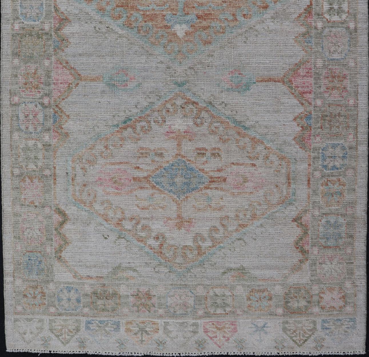 Measures: 3'3 x 5'2 
Modern Oushak in Light Cream Background With Copper and Green Colors. Country of Origin: Afghanistan  Type: Oushak Keivan Woven Arts; rug / AWR-12425,  Design: Floral, All-Over. 21-st Century.

The border and background of this