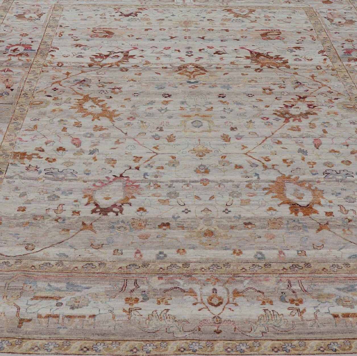 Modern Oushak Muted Rug in Earthy Tones on a Cream Background. Country of Origin: India; Type: Oushak; Design: All-Over, Floral, Oushak Floral; Keivan Woven Arts: rug PUR-31486; All Gray Indian Oushak Rug With All-Over Floral Design in Wool; Floral