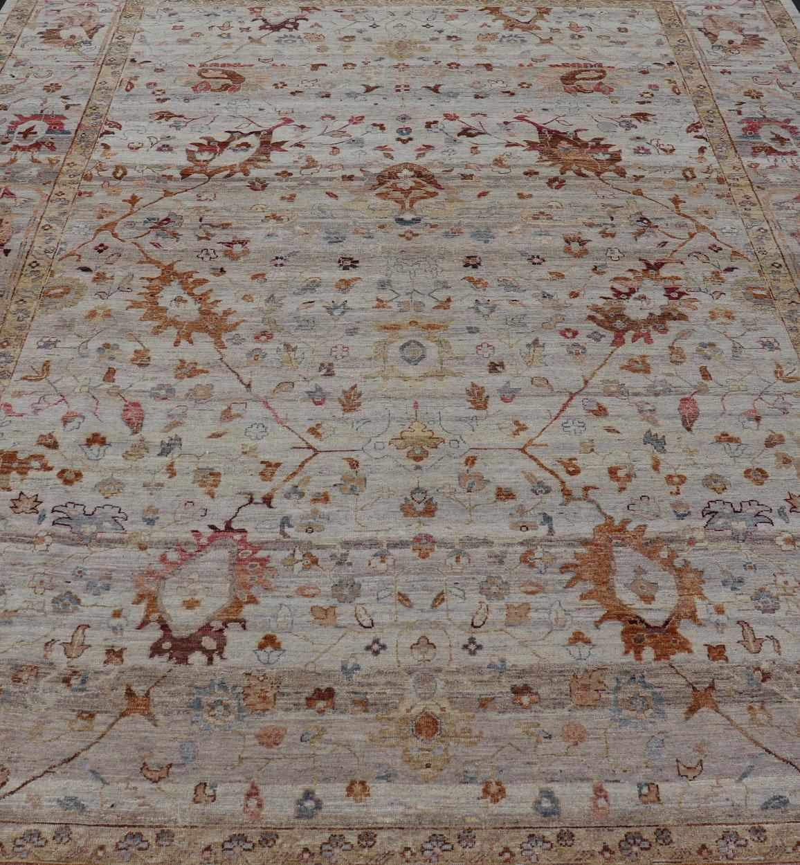 Indian Modern Oushak Muted Rug in Earthy Tones on a Cream Background For Sale