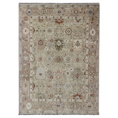Modern Oushak Muted Rug in Greens, Tan, Lt. Blue, Tan and Rusty Red