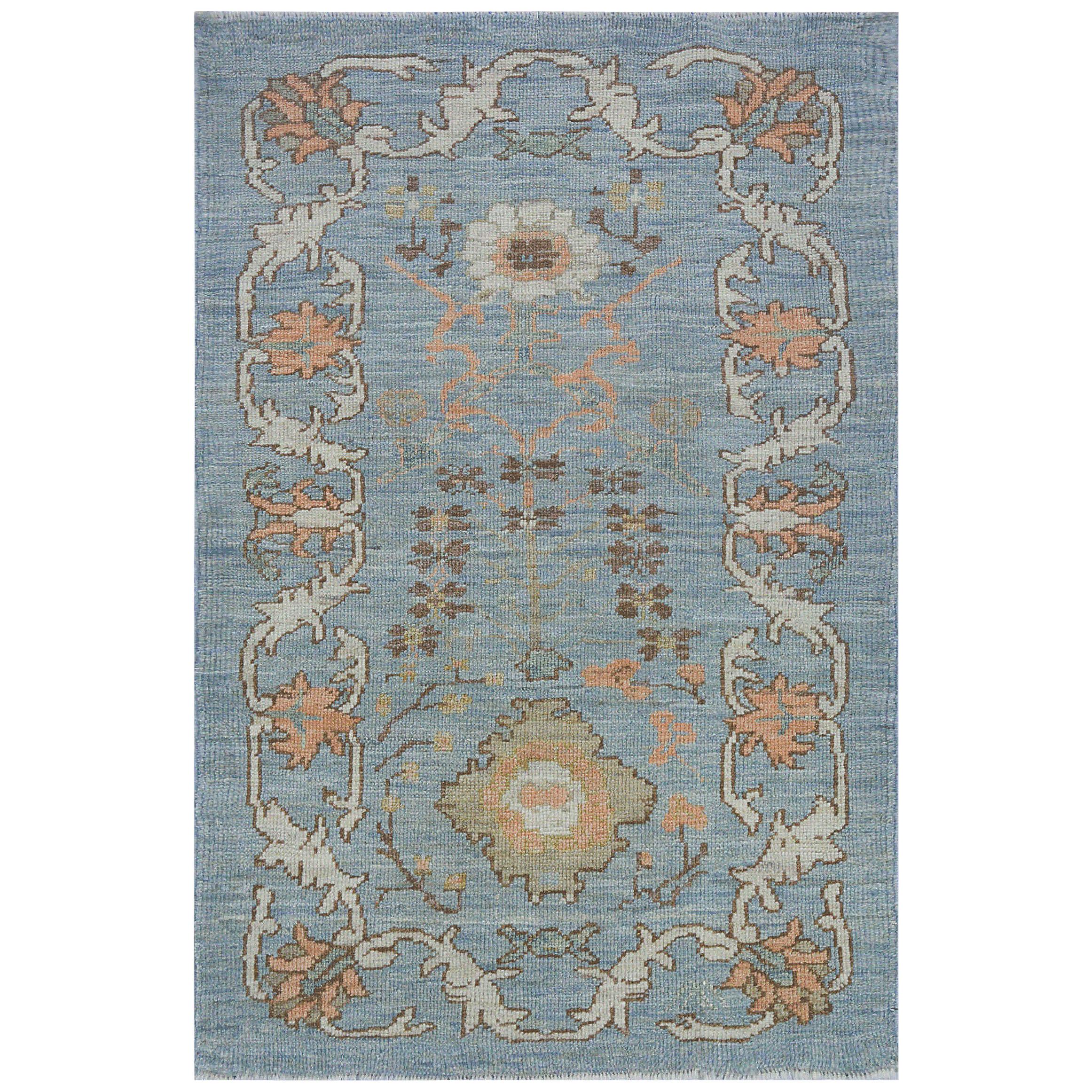 Modern Oushak Rug in Blue with Floral Design Motifs in Ivory, Pink and Brown