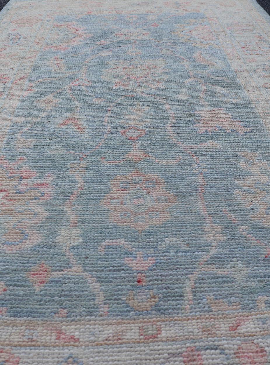 Contemporary Modern Oushak Rug with a Light Blue Field With All-Over Floral Motifs With Cream For Sale