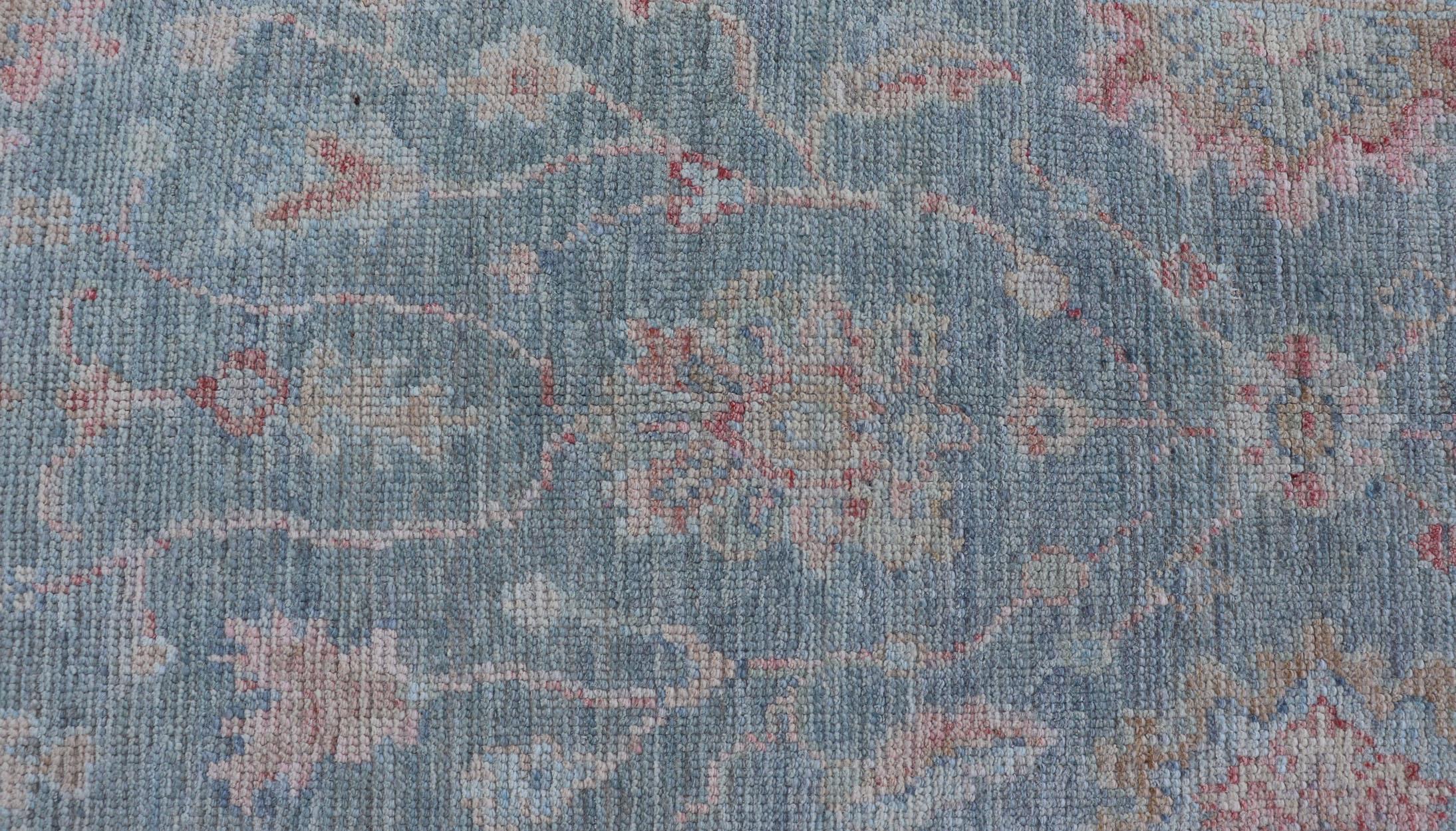 Wool Modern Oushak Rug with a Light Blue Field With All-Over Floral Motifs With Cream For Sale