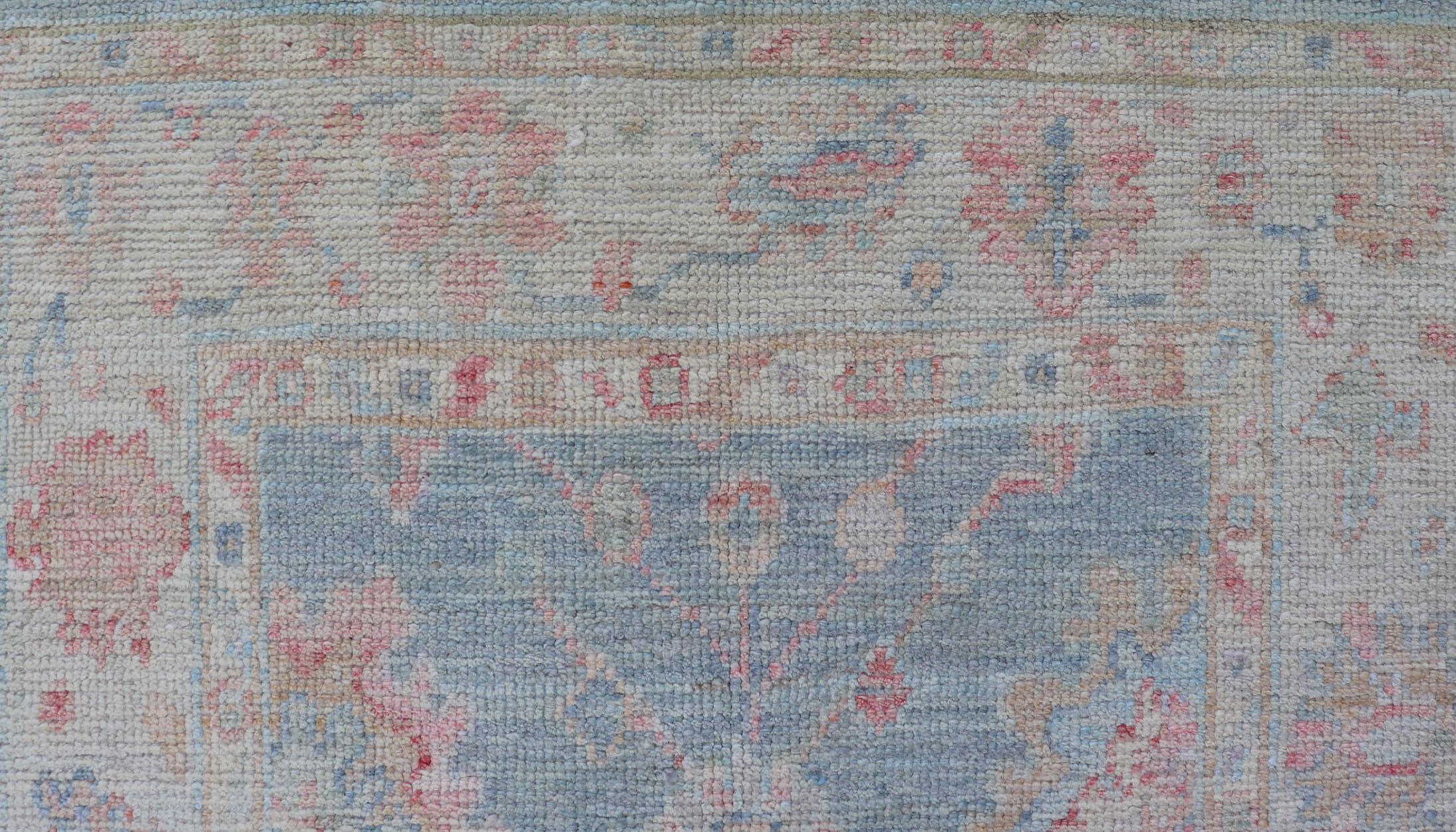 Modern Oushak Rug with a Light Blue Field With All-Over Floral Motifs With Cream For Sale 1