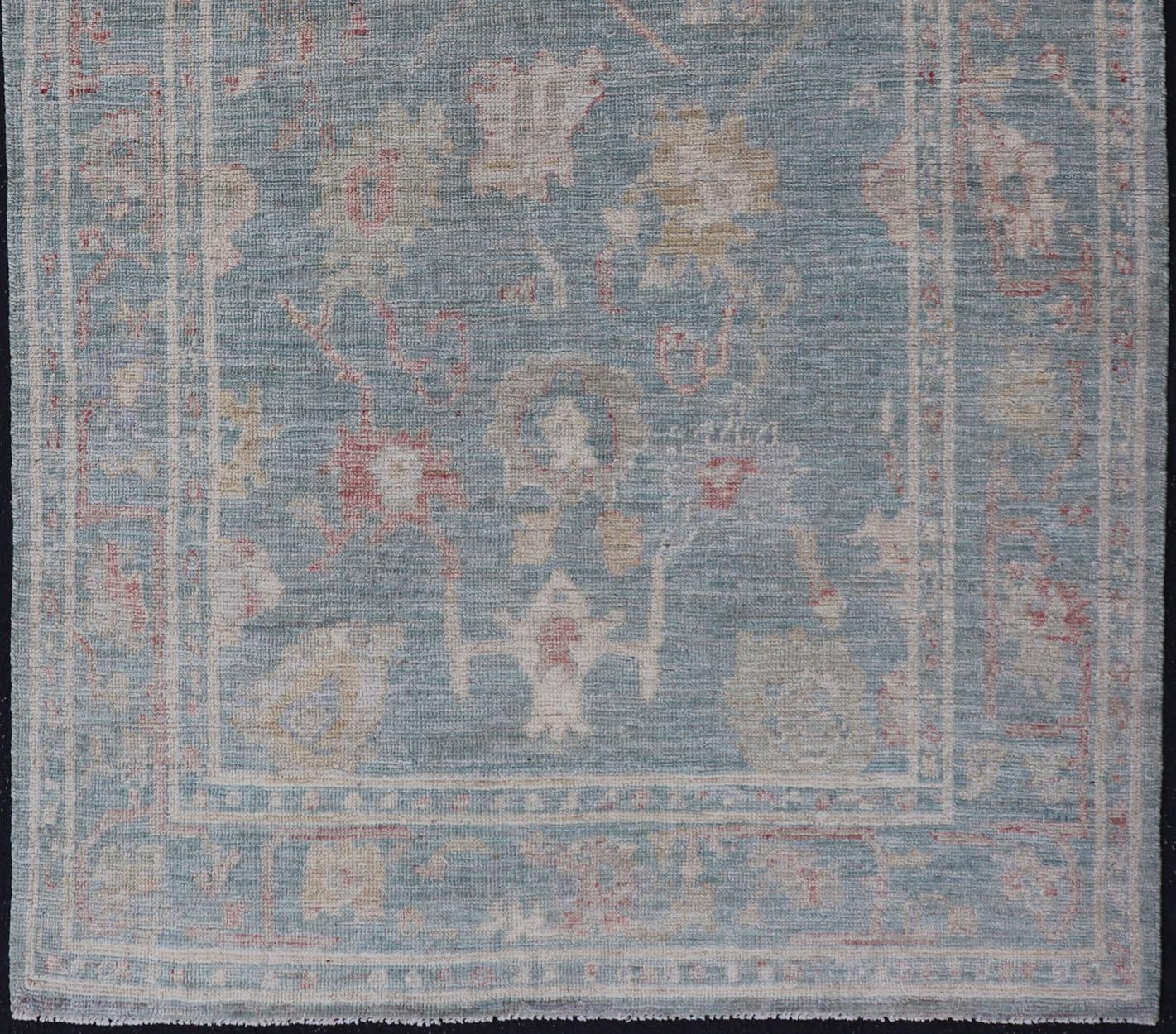 Afghan Modern Oushak Rug with a Light Blue-Gray Field by Keivan Woven Arts  For Sale