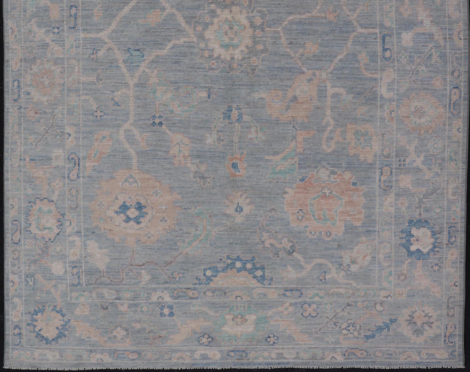 Turkish Modern Oushak Rug With in Light Gray Blue Background and All-Over Floral Motifs For Sale