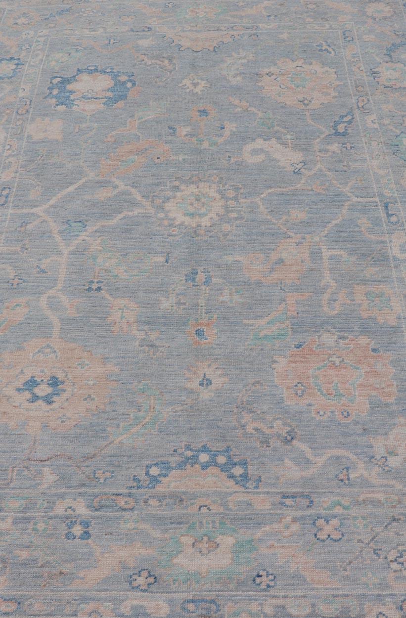 Hand-Knotted Modern Oushak Rug With in Light Gray Blue Background and All-Over Floral Motifs For Sale