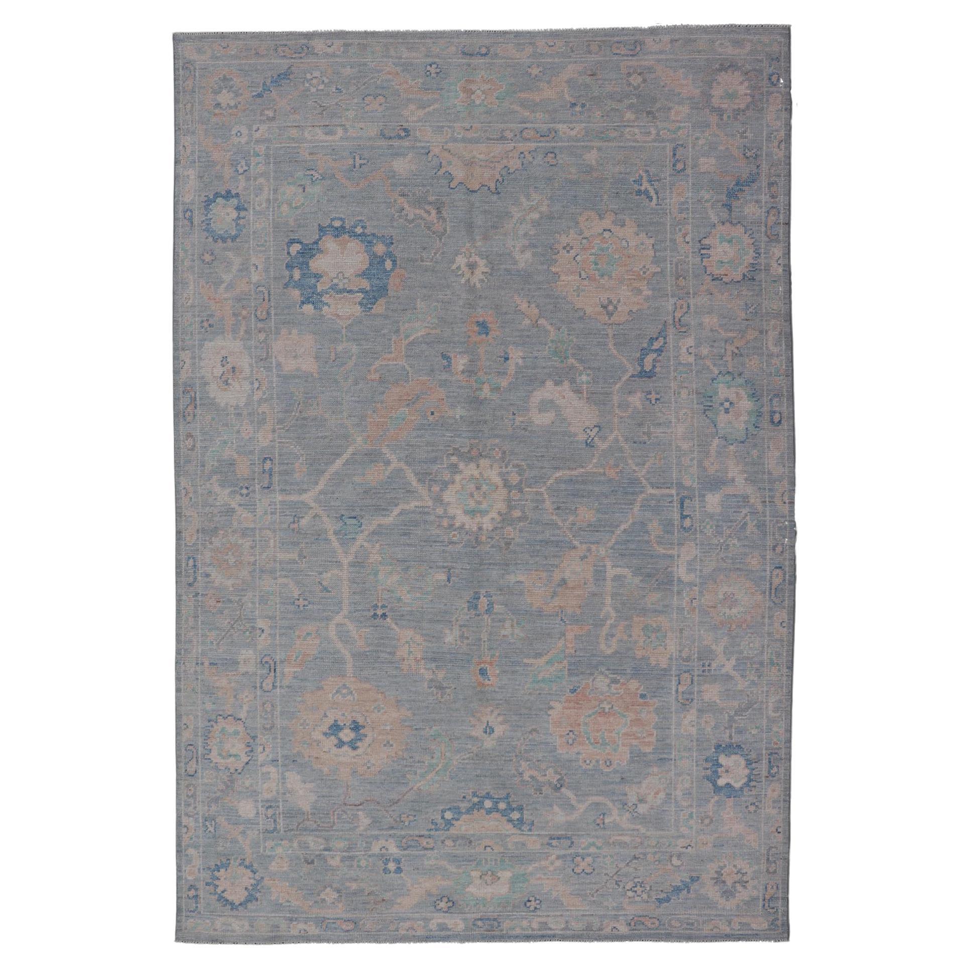 Modern Oushak Rug With in Light Gray Blue Background and All-Over Floral Motifs
