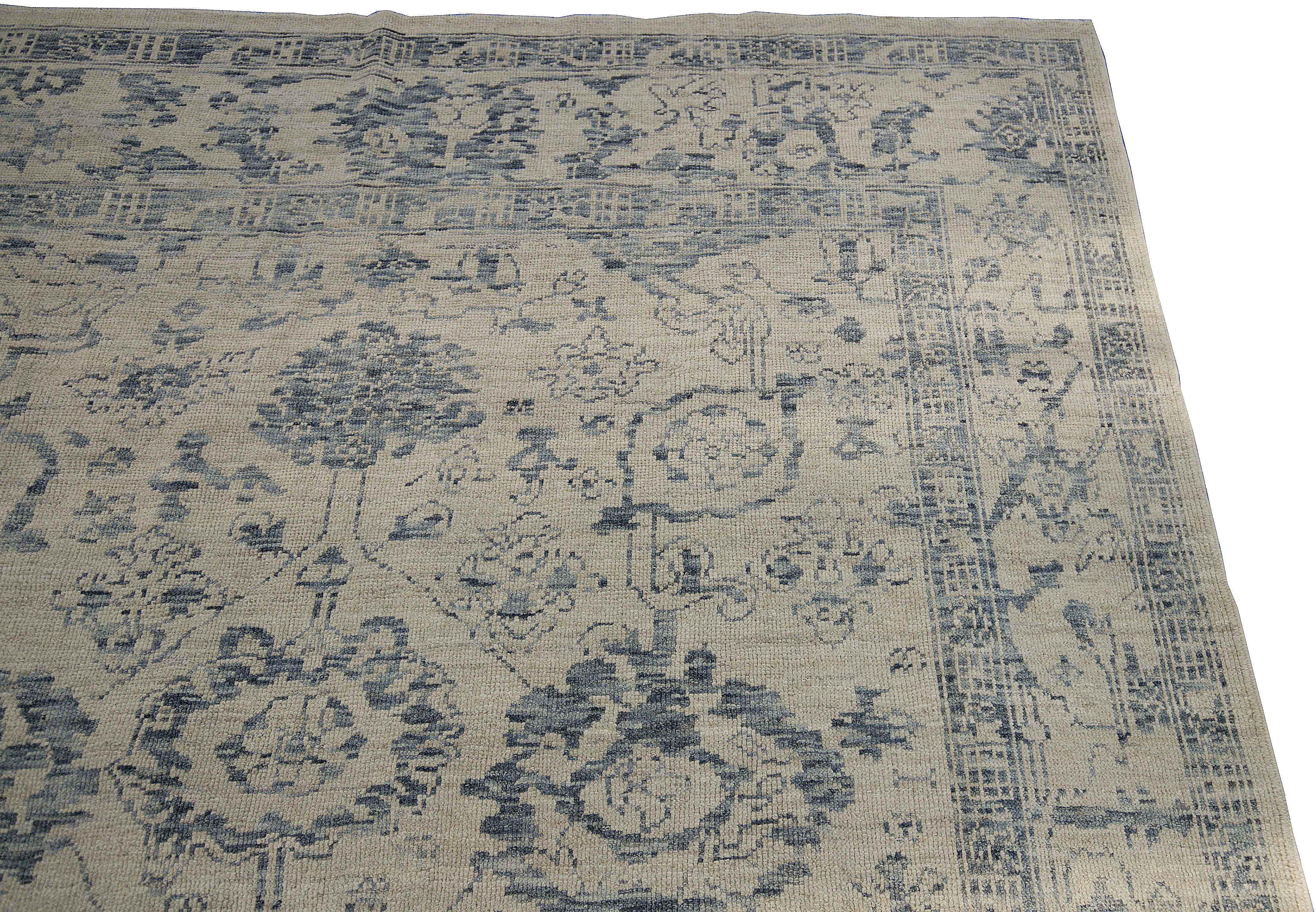Turkish Modern Oushak Rug with Floral Details in Navy and Gray on Beige Ivory Field For Sale