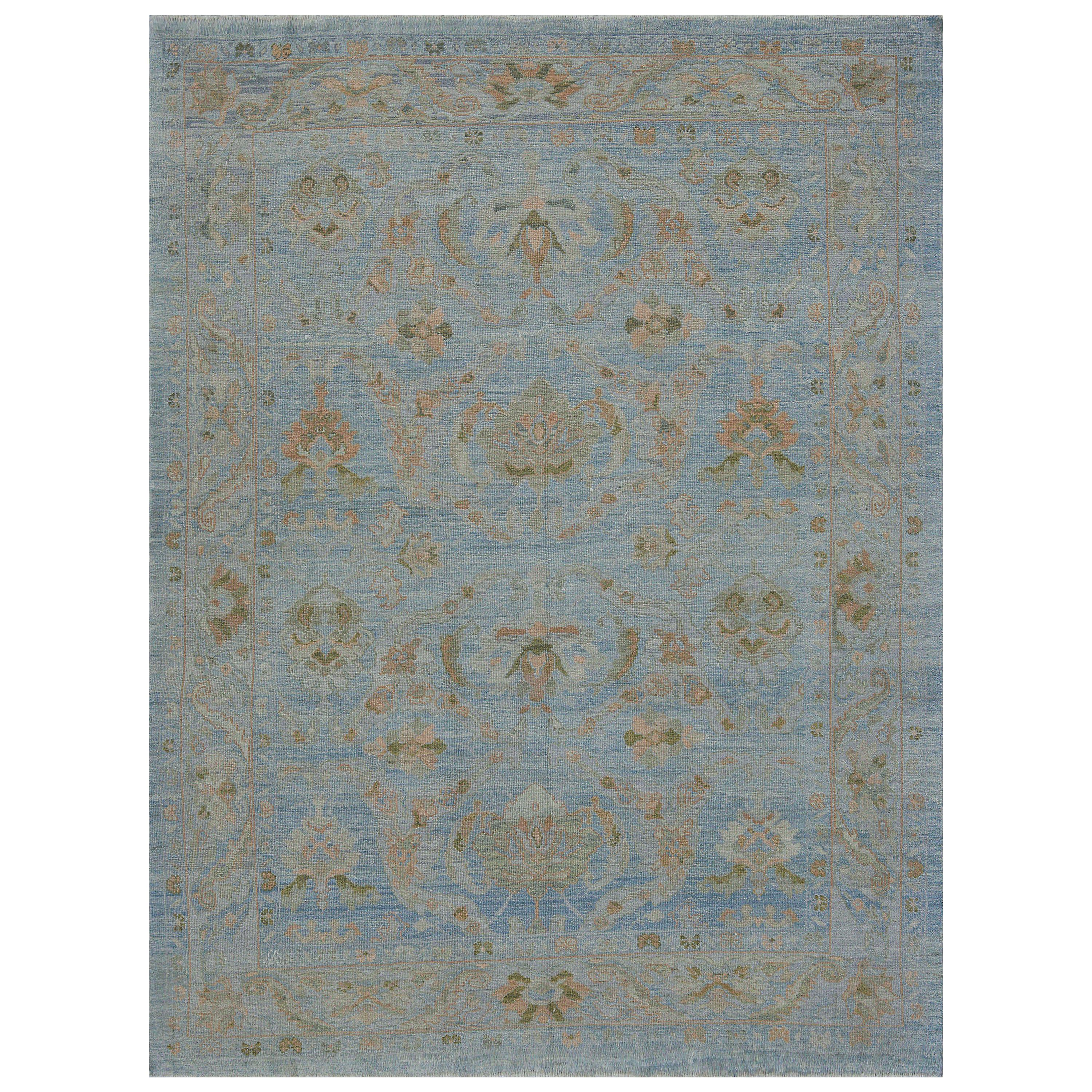 Modern Oushak Rug with Floral Details in Pink and Gray on Blue Field For Sale