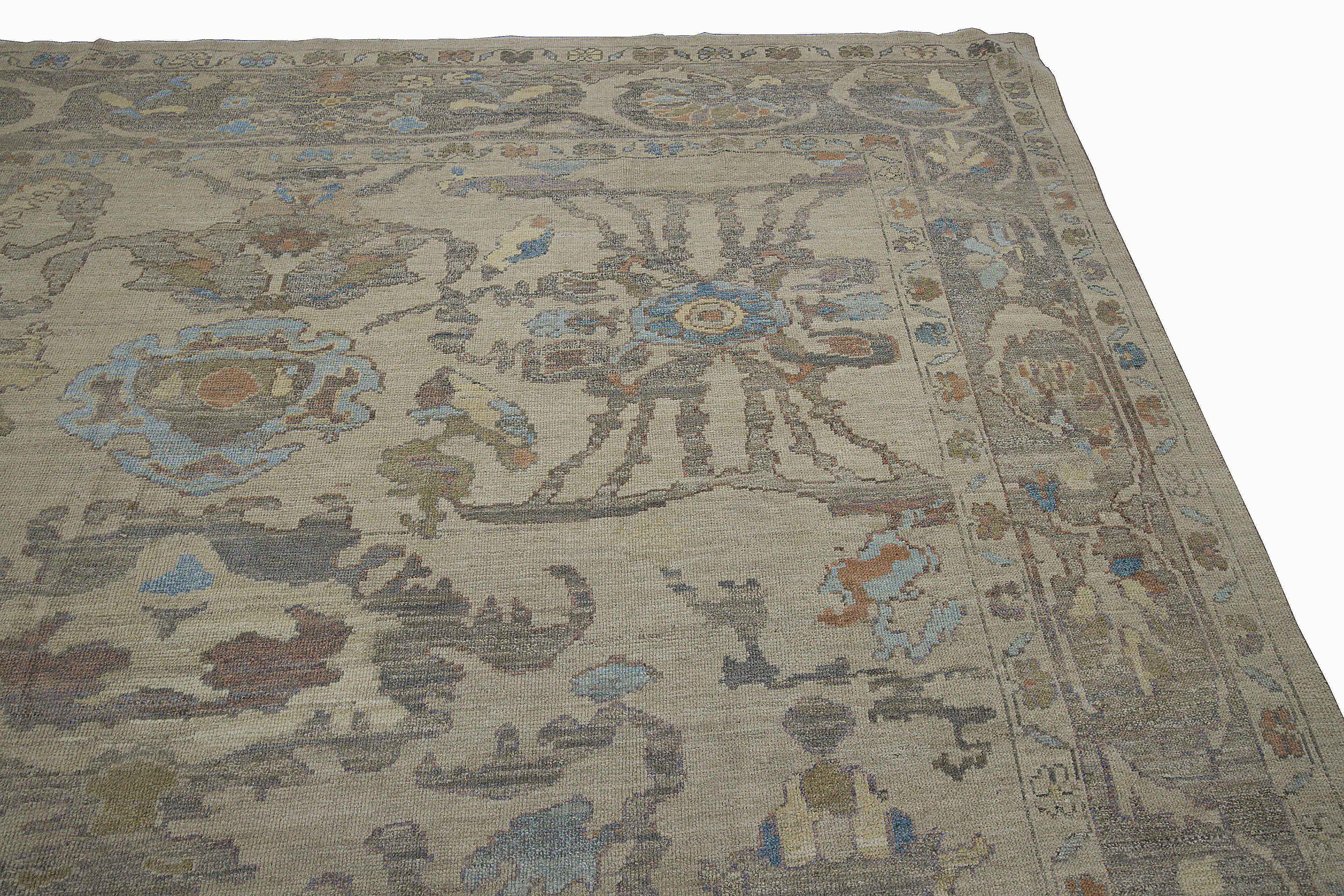 Modern Turkish rug made of handwoven sheep’s wool of the finest quality. It’s colored with organic vegetable dyes that are certified safe for humans and pets alike. It features a lovely beige field with floral details in blue, brown and gray usually