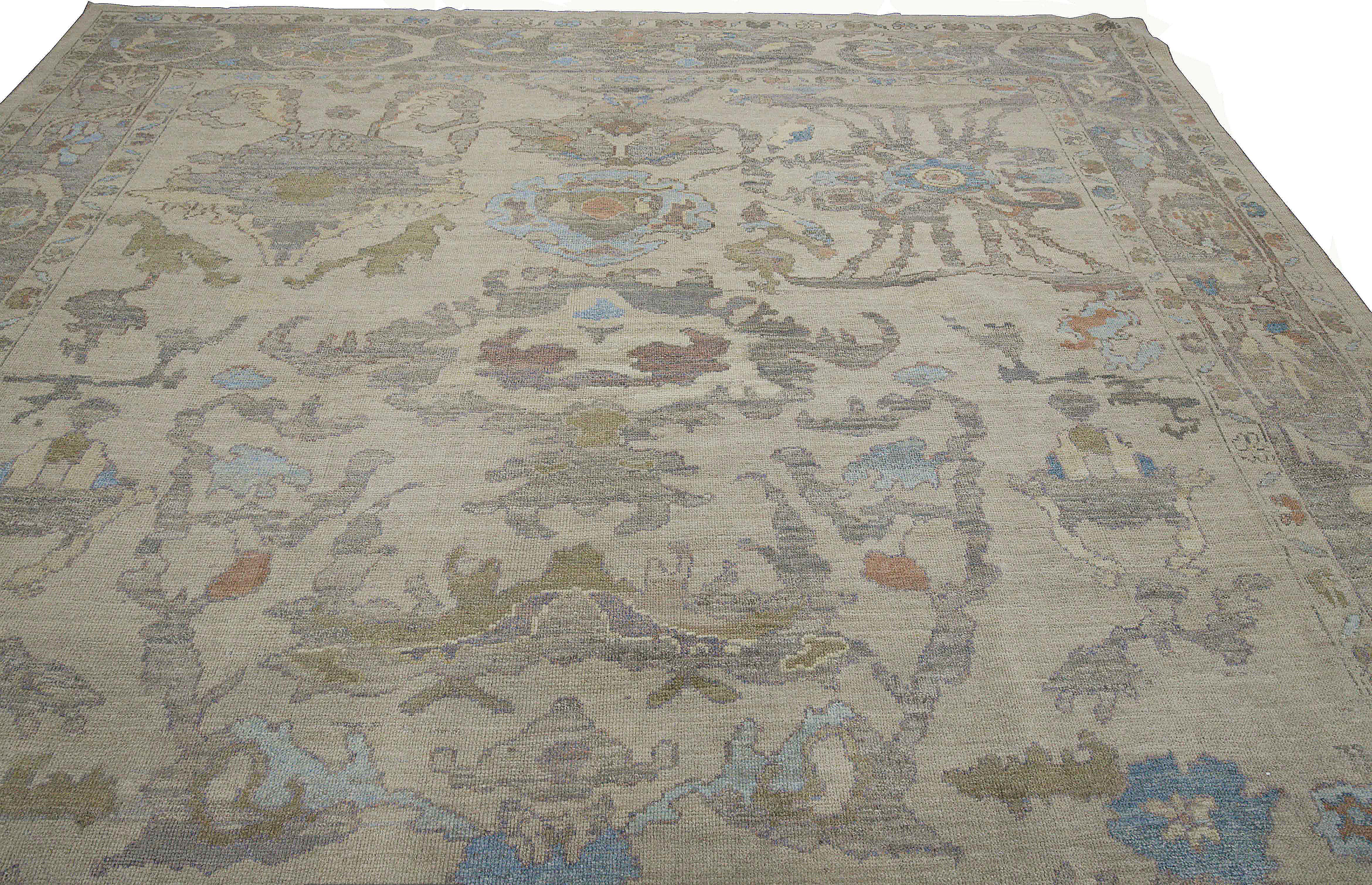 Hand-Woven Modern Oushak Rug with Floral Motifs in Brown, Gray and Blue on Beige Field For Sale