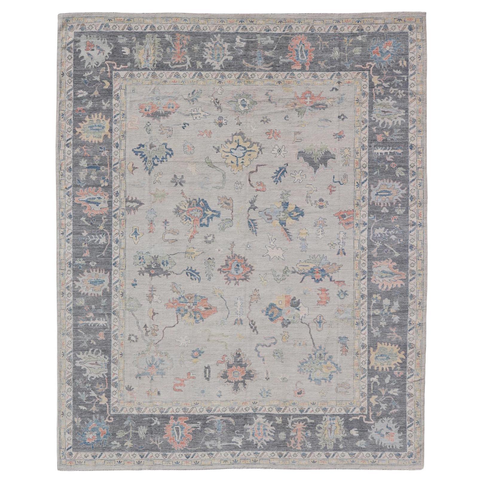 Modern Oushak Rug with Slate Blue Border and Colorful All-Over Tribal Motifs im Angebot