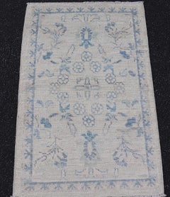 Modern Oushak Rug with Soft Ivory Base and Delicate Sky Blue Floral 1'10 x 3'0