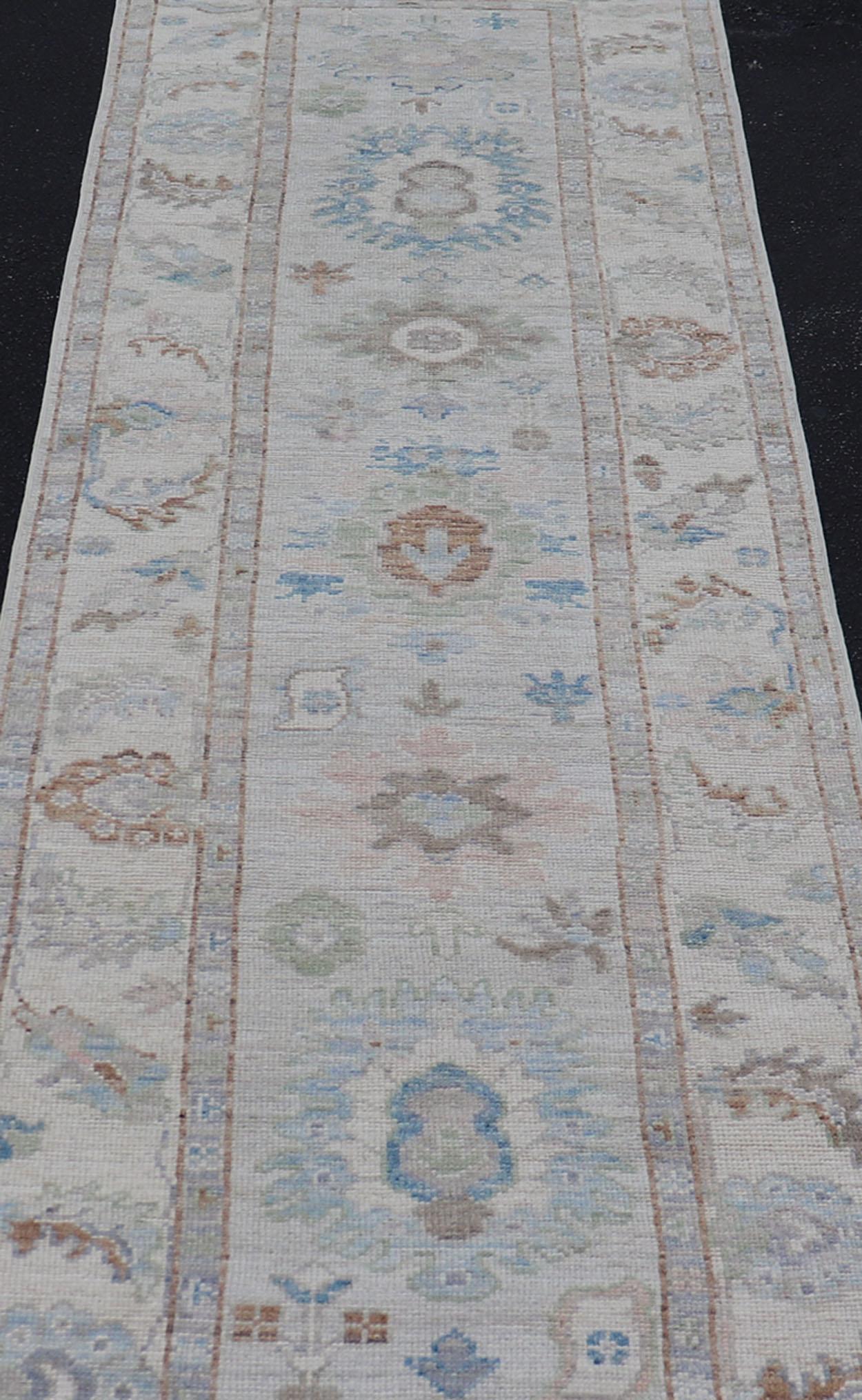 Modern Oushak Runner on Light Cream Field and Colorful Motifs Of Blue & Green For Sale 4