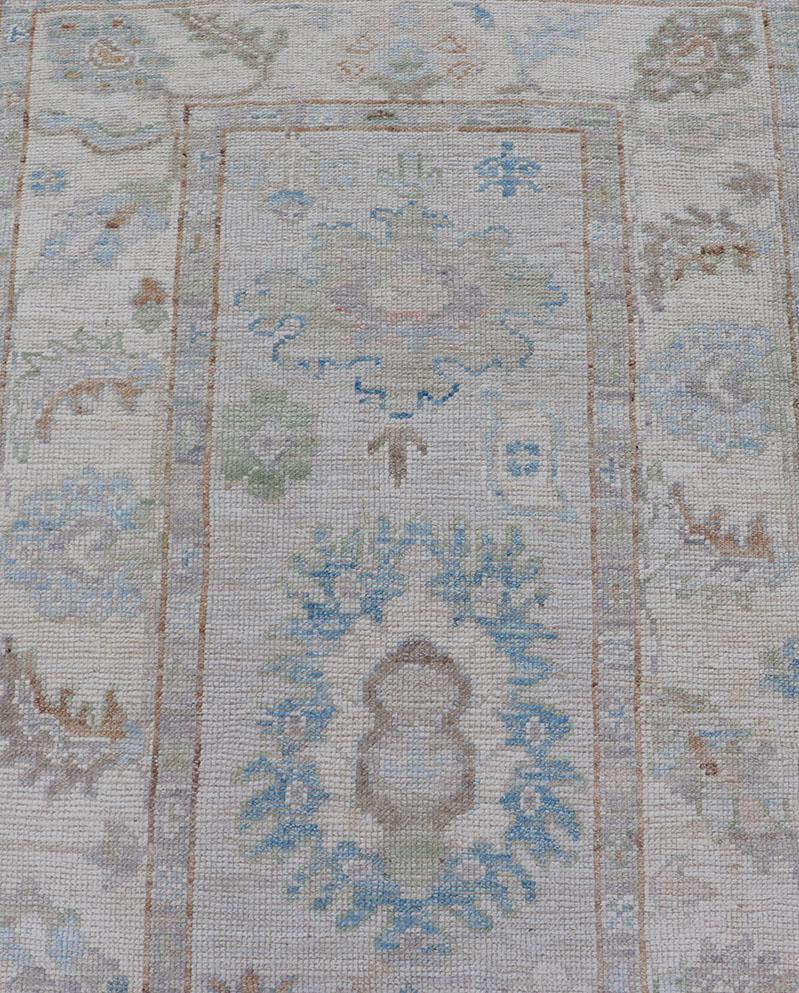 Afghan Modern Oushak Runner on Light Cream Field and Colorful Motifs Of Blue & Green For Sale