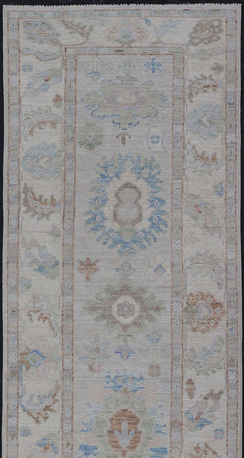 Contemporary Modern Oushak Runner on Light Cream Field and Colorful Motifs Of Blue & Green For Sale