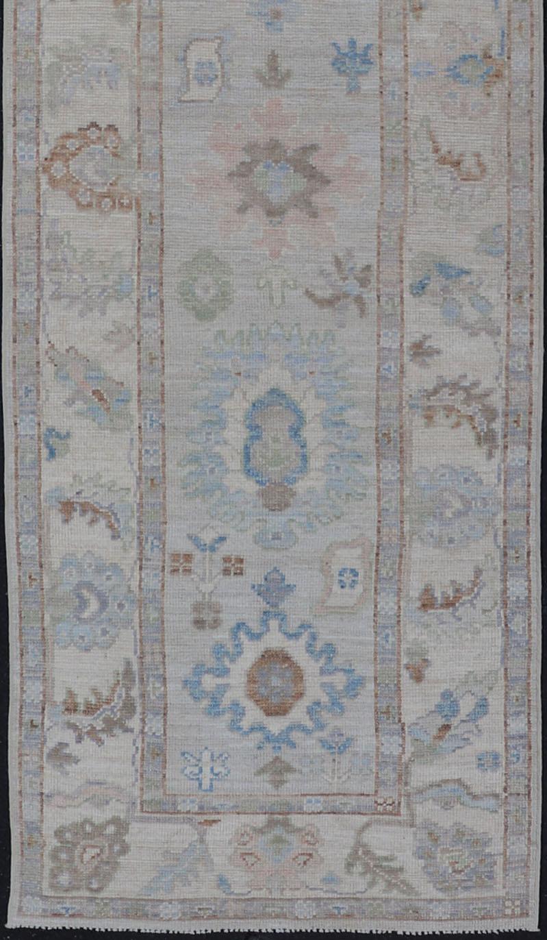 Modern Oushak Runner on Light Cream Field and Colorful Motifs Of Blue & Green For Sale 1