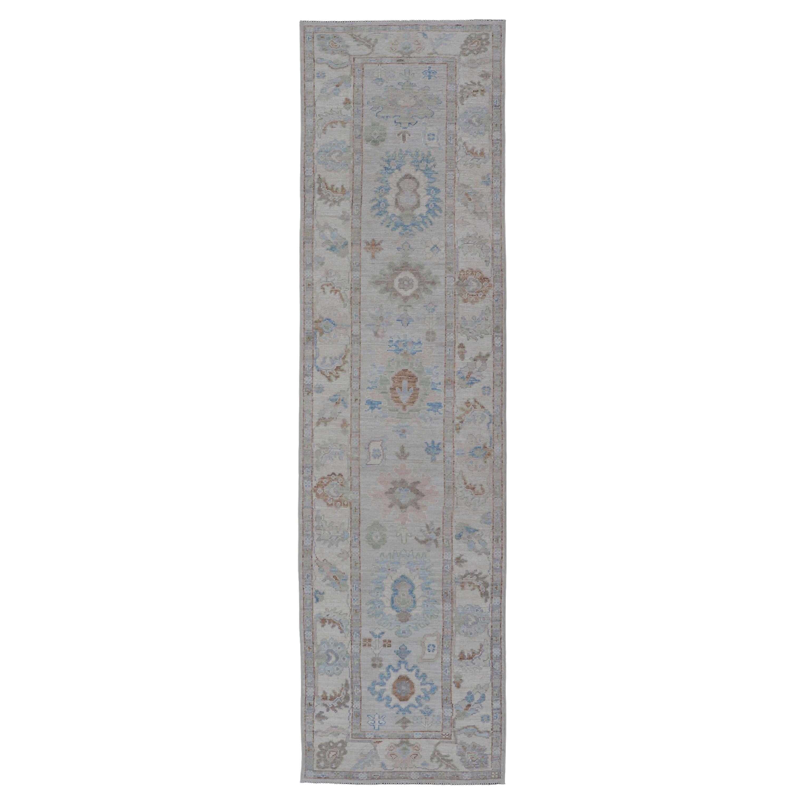 Oushak Runner on Light Cream Field and Colorful Motifs Of Blue & Green