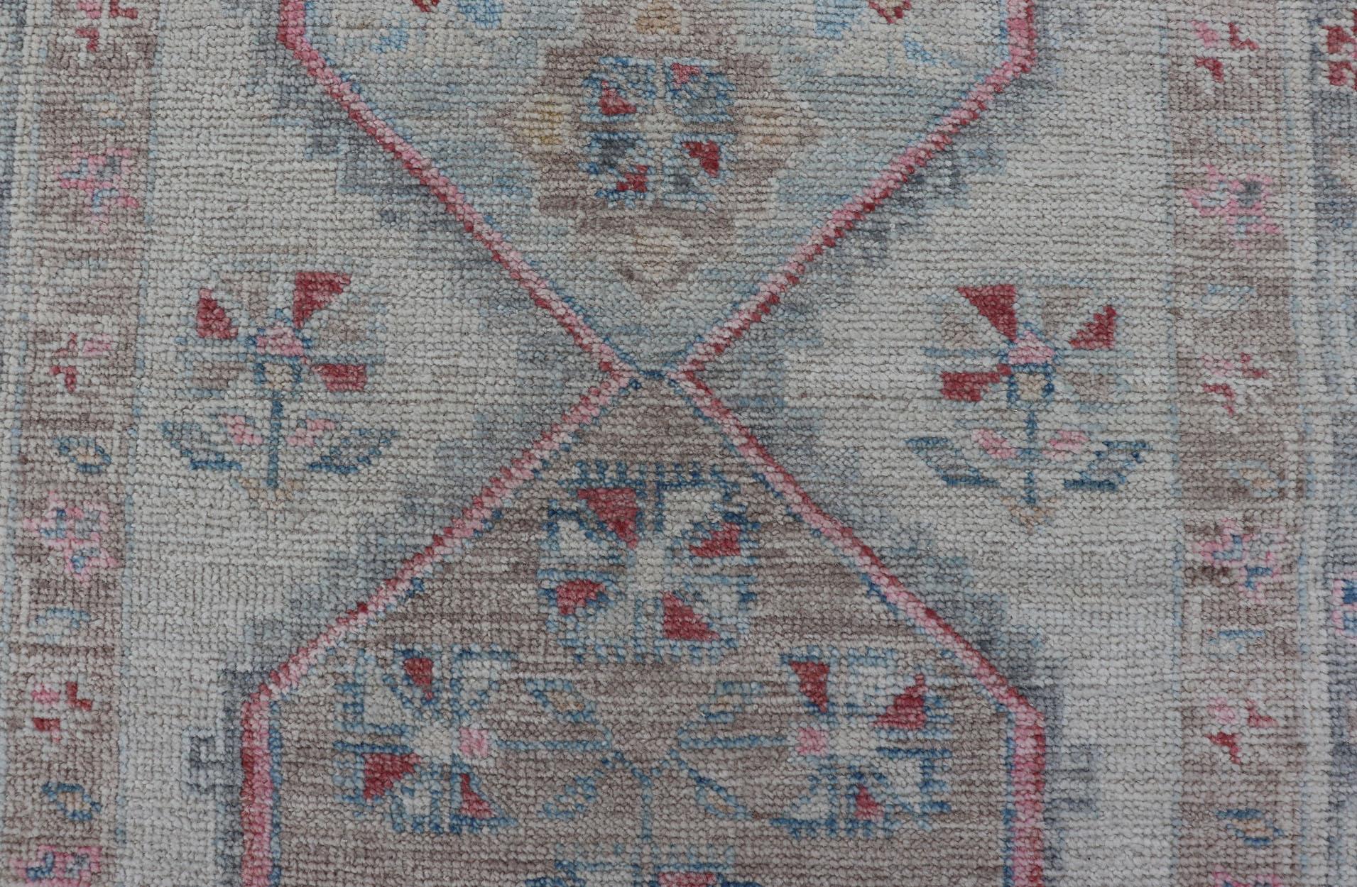 Afghan Modern Oushak Runner with Cream Background and Floral Medallions For Sale