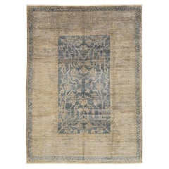 Moderner blauer Wollteppich im Oushak-Stil mit floralem Design