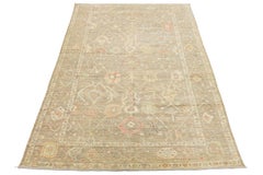 Moderner handgeknüpfter Wollteppich im Oushak-Stil - gedämpfte Erdtöne und pastellfarbene Akzente