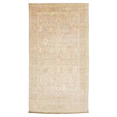 Moderner handgeknüpfter Wollteppich im Oushak-Stil - gedämpfte Erdtöne und pastellfarbene Akzente