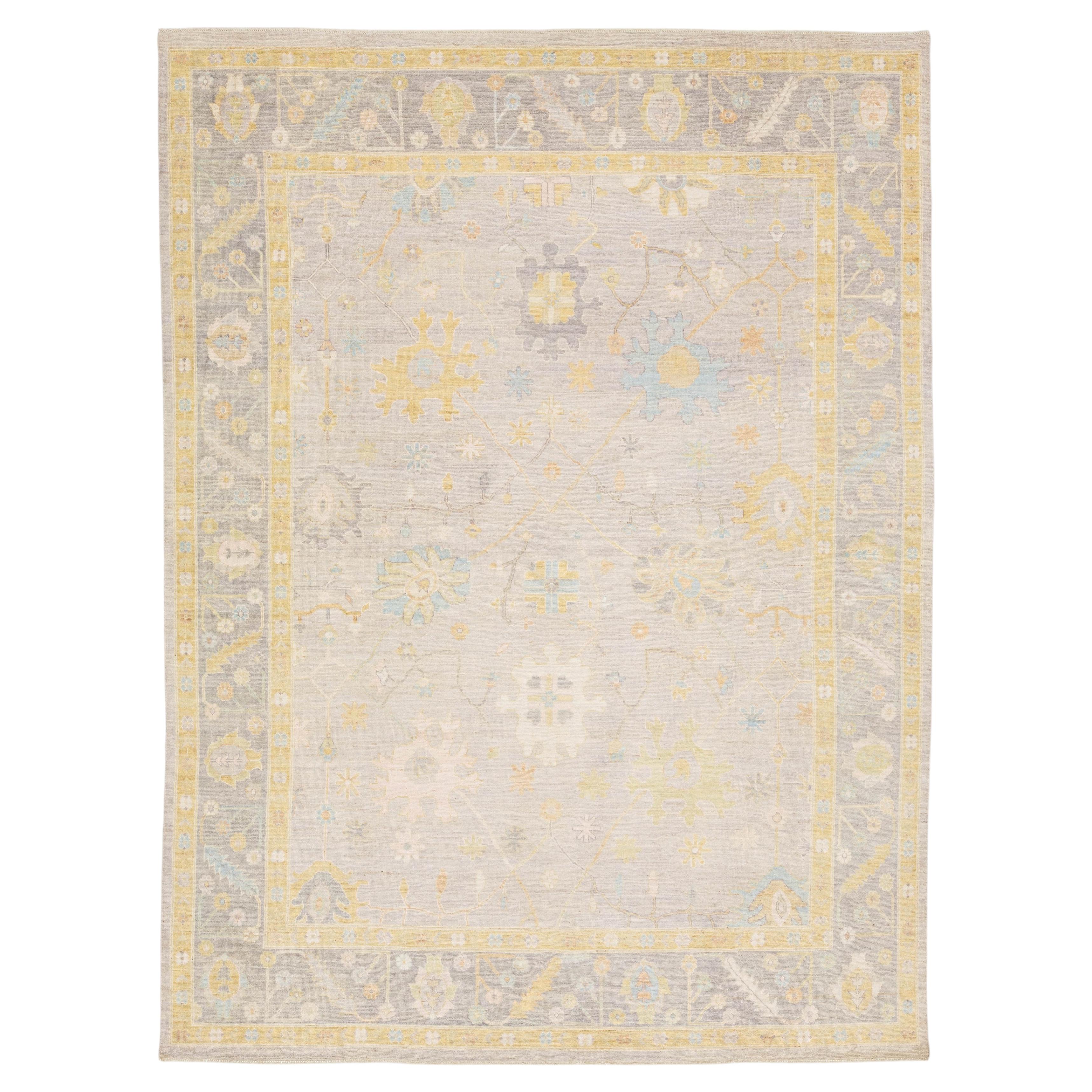 Modern Oushak Style Hand-Knotted Wool Rug - Pastel Floral Motif in Slate & Gold For Sale