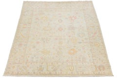 Modern Oushak Style Pastel Wool Rug – Soft Neutrals & Subtle Floral Motifs
